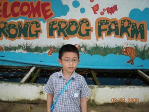 Author aged seven at the Jurong frog farm