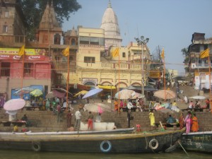 Colourful Scene along the Ganges River: Devotees, Pilgrims and Tourist Boats
