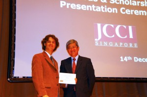 Dr Chris McMorran (left) receives congratulations from Japanese Ambassador to Singapore Yoichi Suzuki 