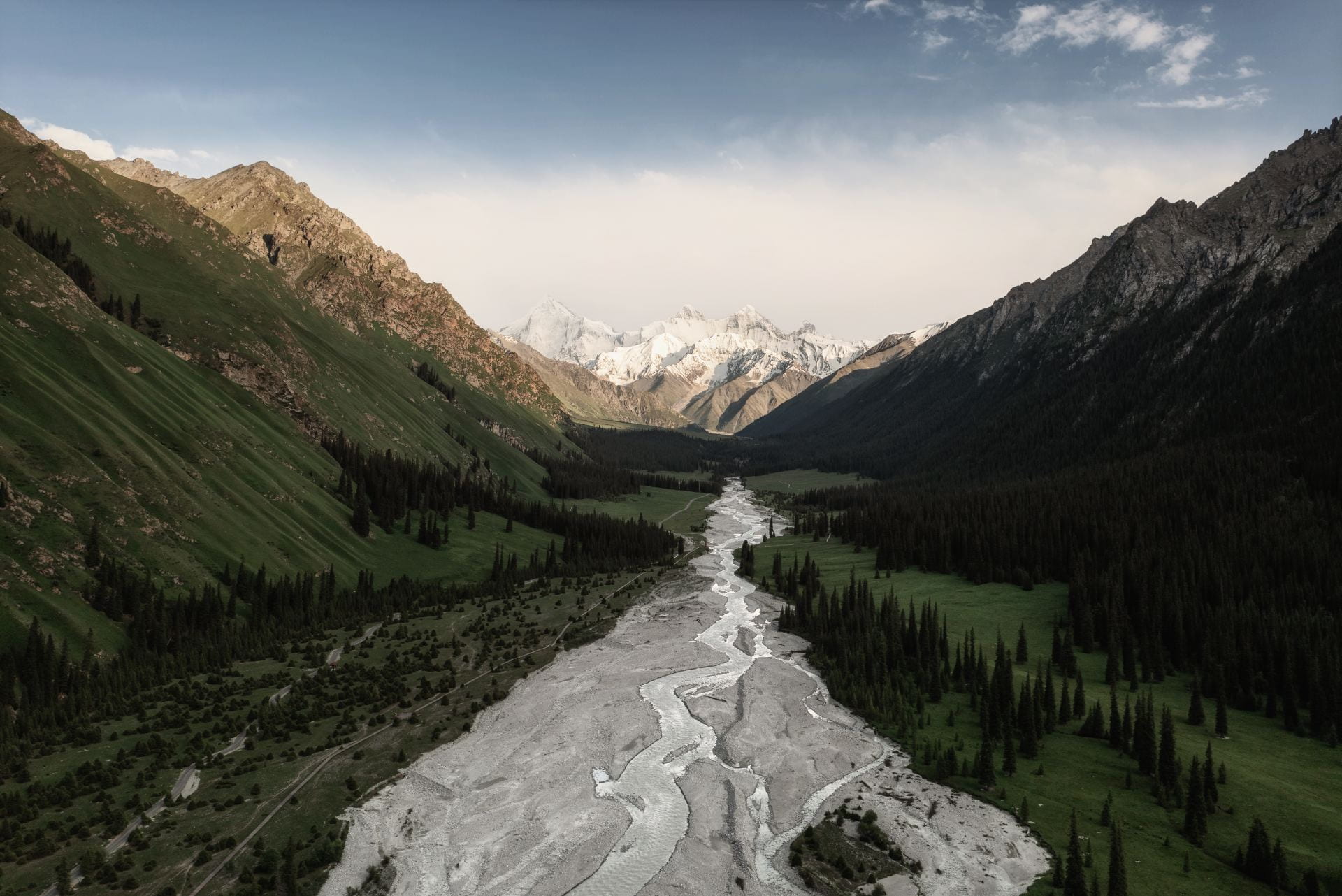 River-and-mountains-with-white-clouds-in-Xinjiang