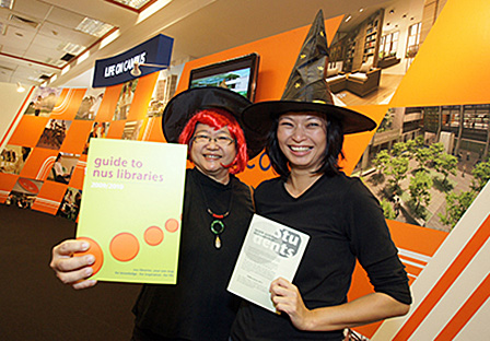 University Librarian, Ms Sylvia Yap (gamely wearing a red wig) and Librarian Winnifred Wong